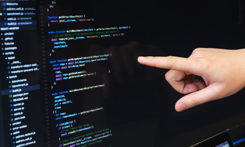 finger-pointing-at-javascript-code